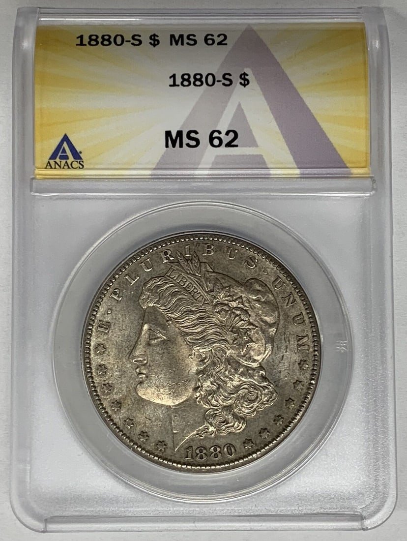 Toned 1880-S Morgan Dollar Silver Coin ANACS MS62 Certified: Toned 1880-S Morgan Dollar Silver Coin ANACS MS62 Certified This 1880-S Morgan Silver Dollar is an uncirculated coin certified by ANACS with a grade of MS 62. The coin features a toned finish and is c