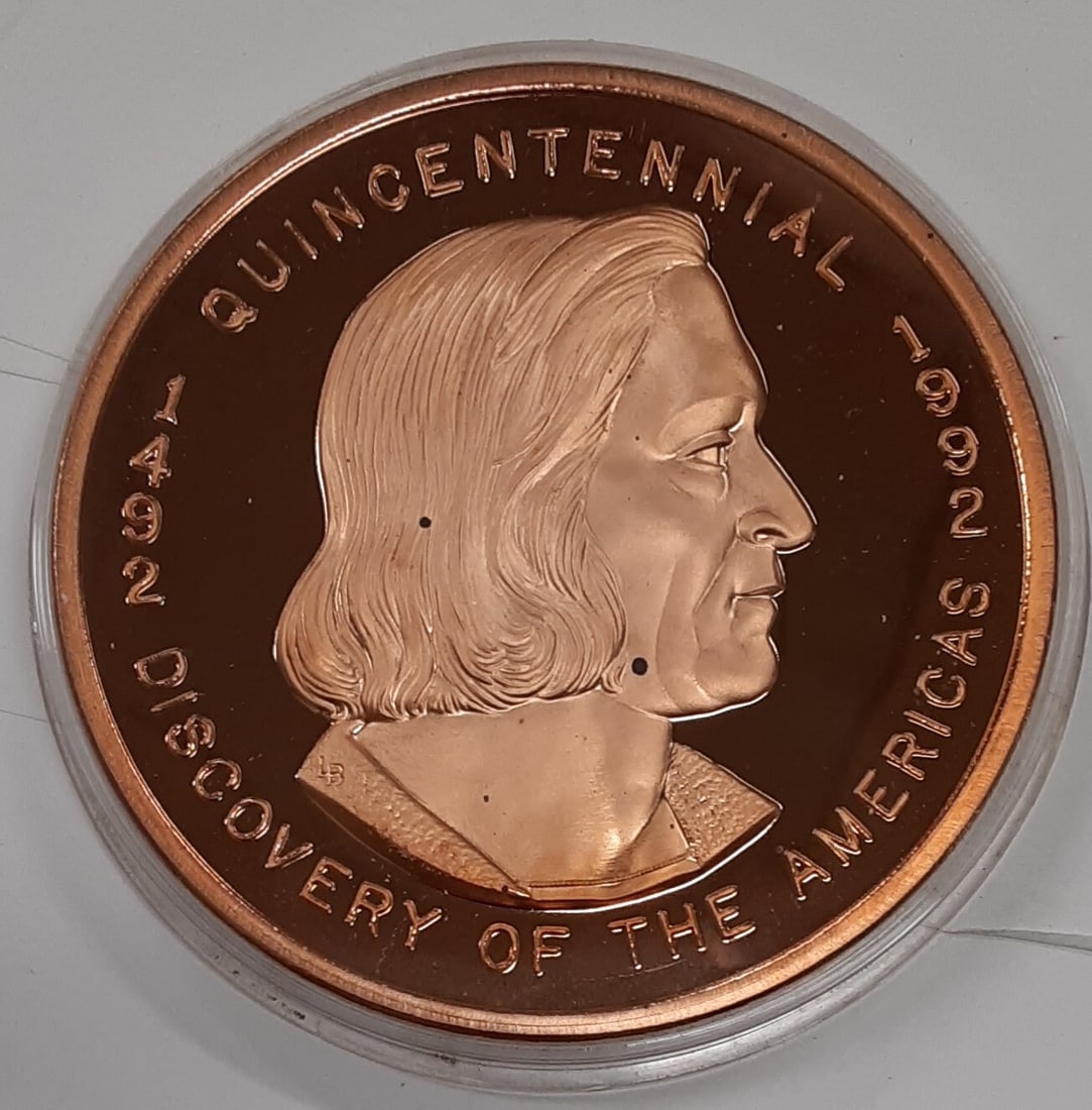 1992 One Pound Copper Columbus Quincentennial Prooflike Round in Protective Capsule: 1992 One Pound Copper Columbus Quincentennial Prooflike Round in Protective Capsule This 1992 Columbus Quincentennial Discovery of the Americas commemorative round is made of .999 pure copper. The pro
