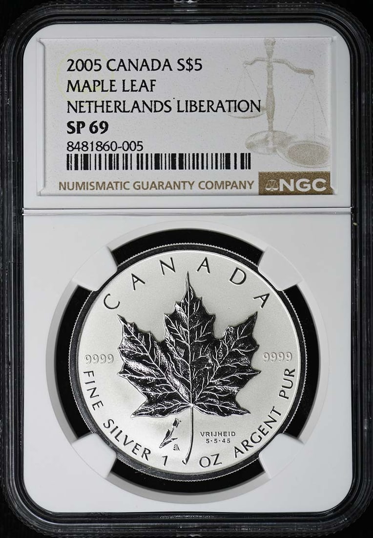 Canada 2005 $5 Maple Leaf Netherlands Liberation Coin NGC SP69: Canada 2005 $5 Maple Leaf Netherlands Liberation Coin NGC SP69 This 2005 Canada Maple Leaf Netherlands Liberation $5 coin is certified by NGC with a grade of SP69. It is an uncirculated collectible co
