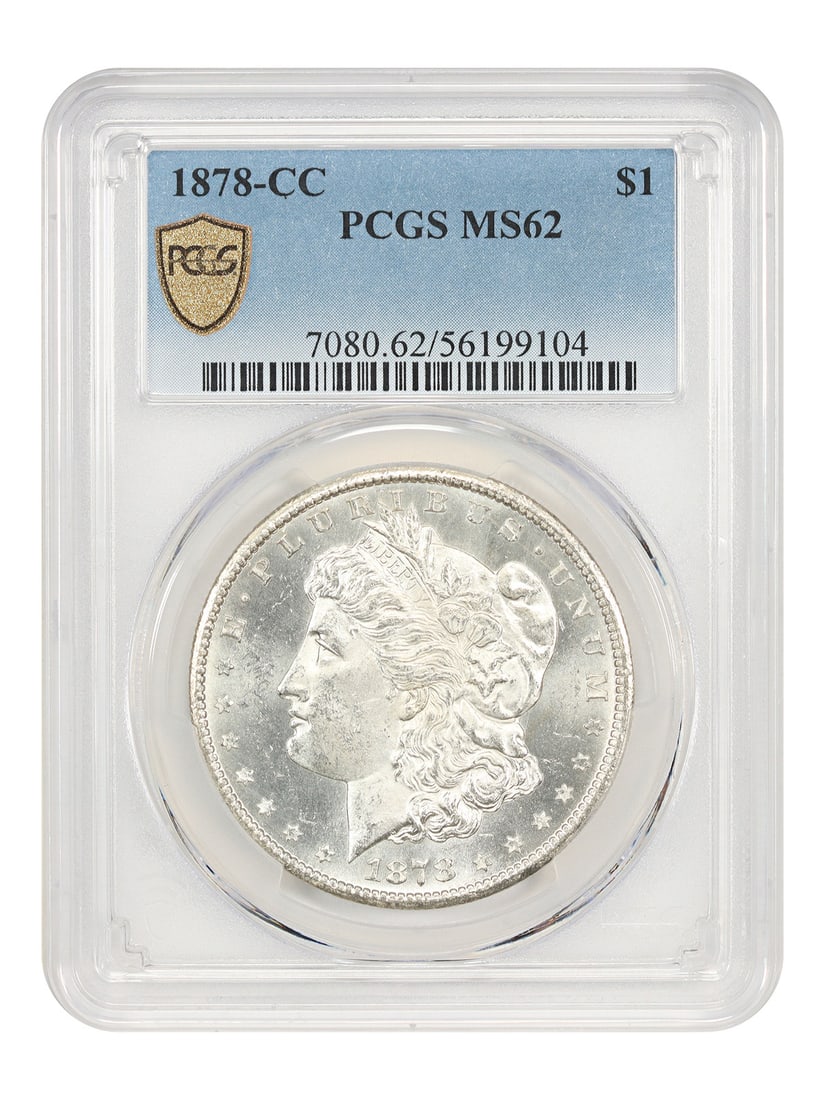 PCGS MS62 Carson City 1878 Morgan Silver Dollar First Year Issue: PCGS MS62 Carson City 1878 Morgan Silver Dollar First Year Issue This 1878-CC Morgan Dollar is graded MS62 by PCGS and features the first-year Carson City mintmark. The coin is uncirculated and part o