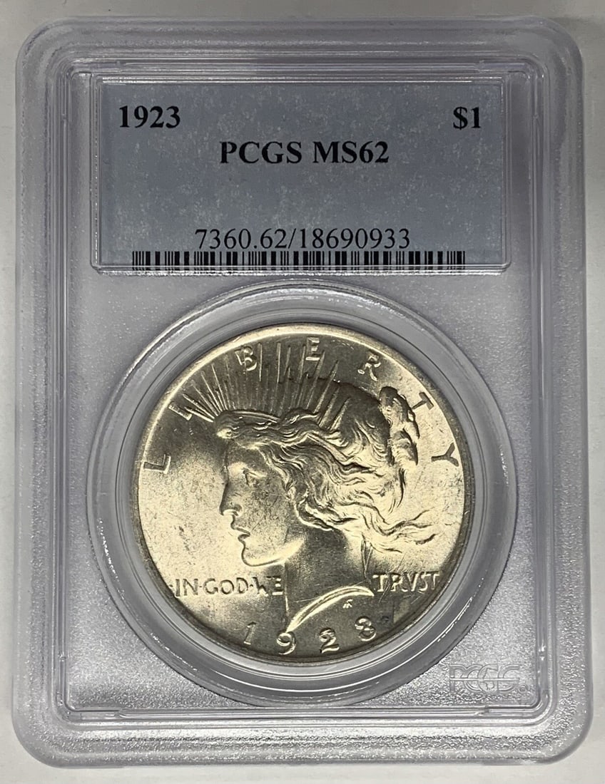 1923 Peace Dollar Silver Coin PCGS MS 62 Certified United States $1: 1923 Peace Dollar Silver Coin PCGS MS 62 Certified United States $1 This is a 1923 Peace Silver Dollar coin from the United States, certified by PCGS with a grade of MS 62. The coin is uncirculated an