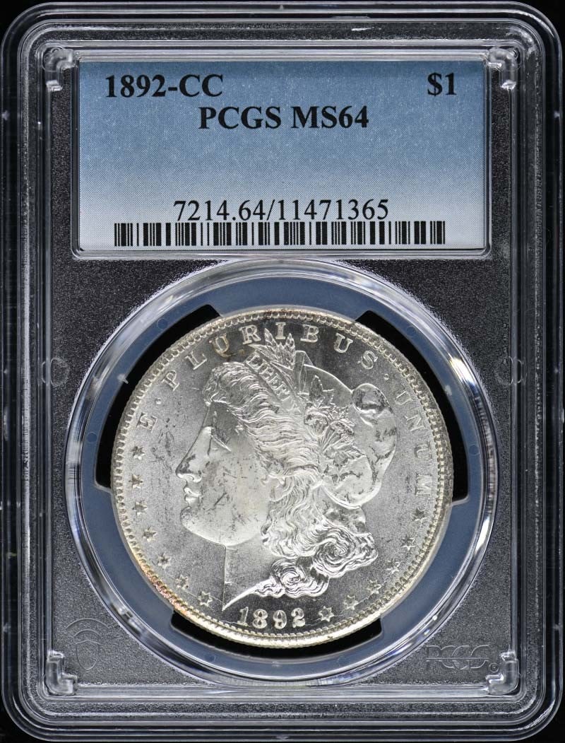 1892-CC Morgan Dollar PCGS MS64 Uncirculated Coin: 1892-CC Morgan Dollar PCGS MS64 Uncirculated Coin This 1892-CC Morgan Dollar is a stunning example of American coinage, certified by PCGS with a grade of MS64. Struck in Carson City, this uncirculated