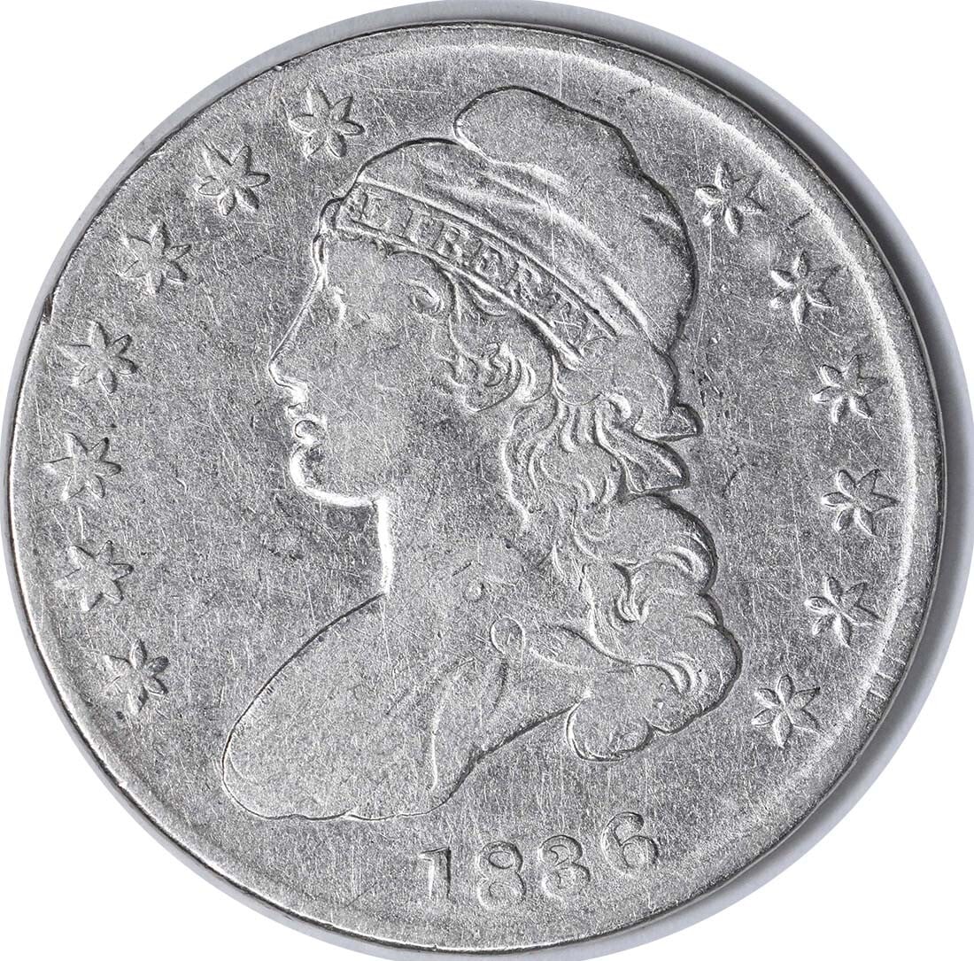 1836 Silver Half Dollar with Lettered Edge Uncertified Bust Design: 1836 Silver Half Dollar with Lettered Edge Uncertified Bust Design This is an 1836 Bust Silver Half Dollar featuring a lettered edge. The coin is circulated and uncertified, with a grade of F (Fine). 