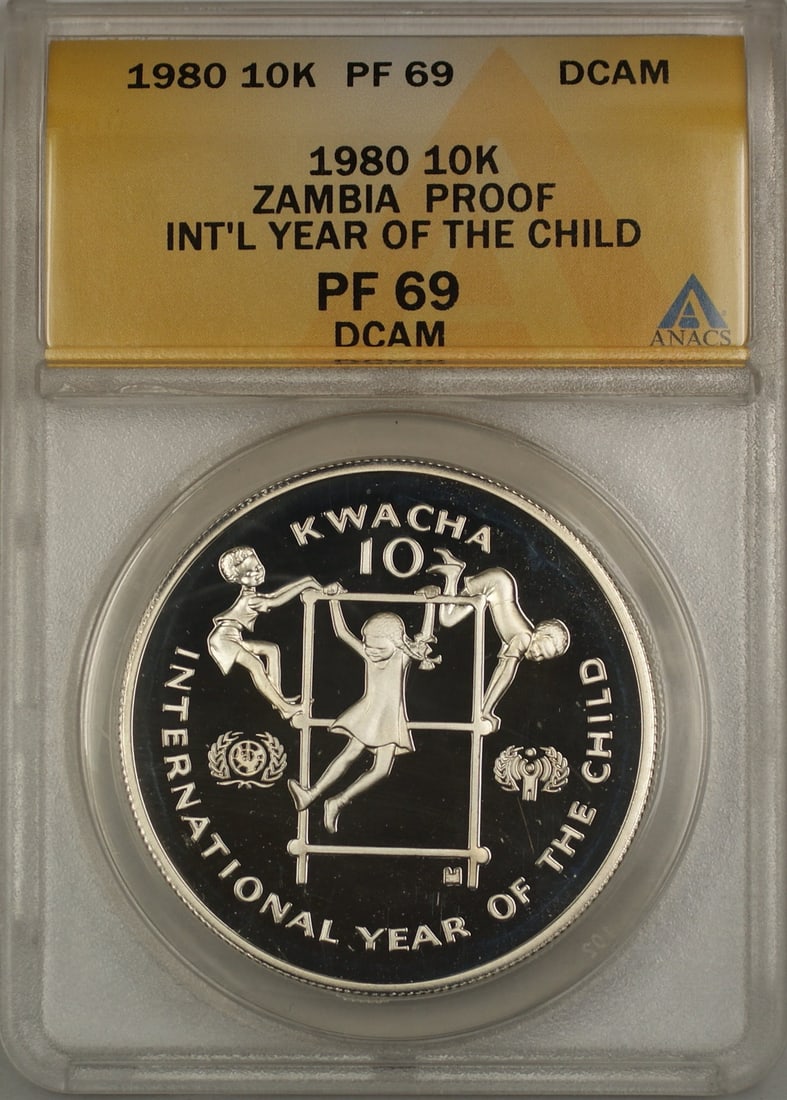 Zambia 1980 10 Kwacha Silver Proof Coin ANACS PF 69 DCAM Year of the Child: Zambia 1980 10 Kwacha Silver Proof Coin ANACS PF 69 DCAM Year of the Child This 1980 Zambia 10 Kwacha proof coin commemorates the Year of the Child. Struck in sterling silver with a fineness of 0.925,