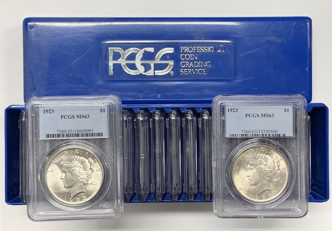 Lot of 20 1923 Peace Dollars PCGS MS 63 Silver Coins: Lot of 20 1923 Peace Dollars PCGS MS 63 Silver Coins This lot features a roll of 20 uncirculated 1923 Peace Silver Dollars, each certified by PCGS with a grade of MS 63. Struck in silver, these coins 
