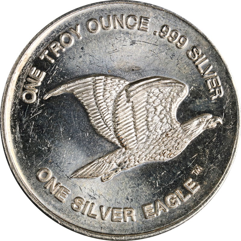 One Ounce 999 Fine International Silver Trade Unit Silver Eagle Coin: One Ounce 999 Fine International Silver Trade Unit Silver Eagle Coin This International Silver Trade Unit is a one-ounce coin composed of 0.999 fine silver. The coin is in Mint State and uncirculated 