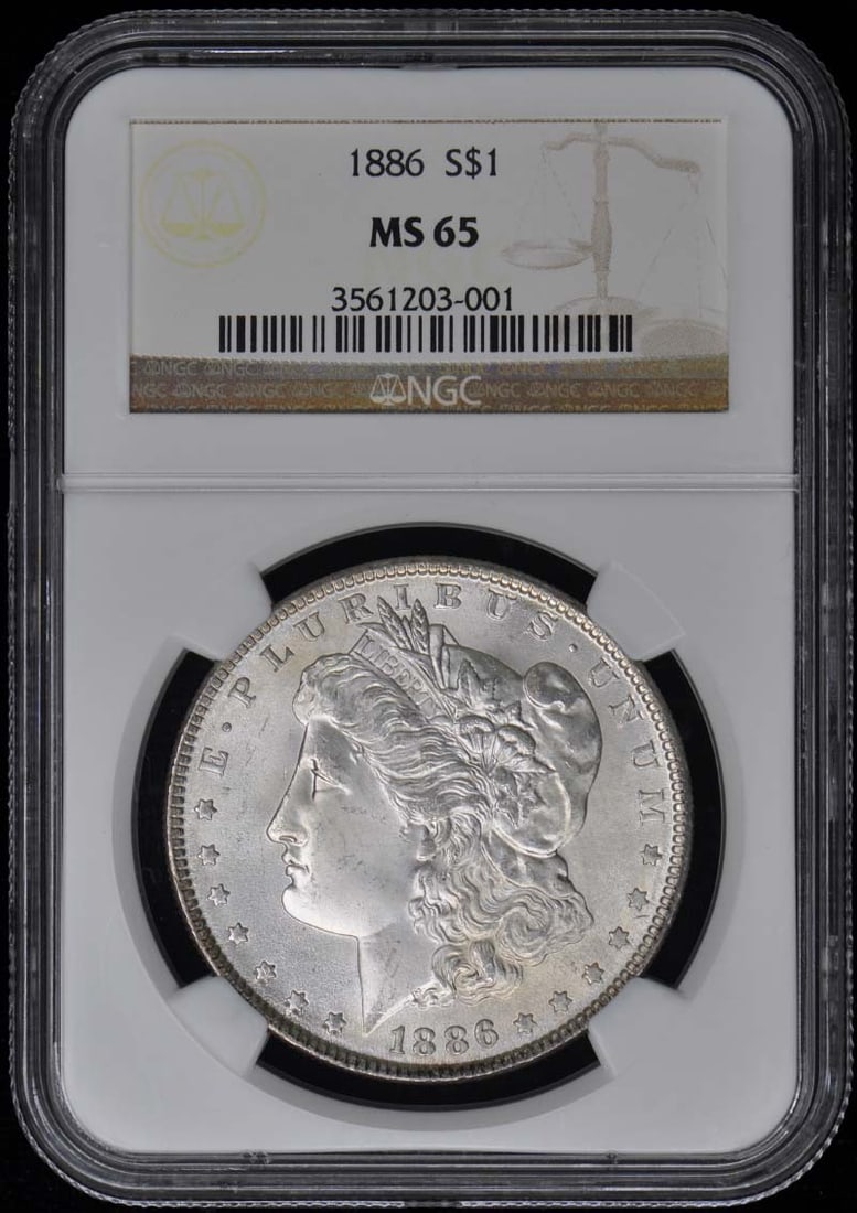 1886 Morgan Dollar NGC MS65 Uncirculated Philadelphia Coin: 1886 Morgan Dollar NGC MS65 Uncirculated Philadelphia Coin This 1886 Morgan Dollar is a stunning piece, certified by NGC with a grade of MS65, indicating its uncirculated condition. Minted in Philadel