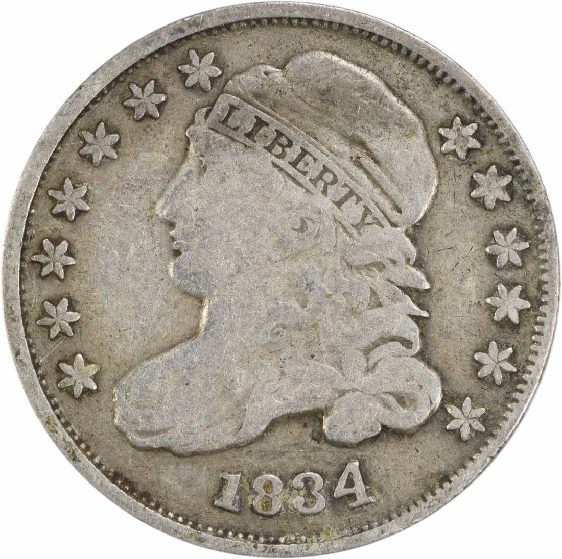 1834 Capped Bust Dime 10C Uncertified Philadelphia Silver Coin: 1834 Capped Bust Dime 10C Uncertified Philadelphia Silver Coin This 1834 Capped Bust Silver Dime is a notable piece for collectors, featuring a grade of Fine (F) and a composition of 89.2% silver and 