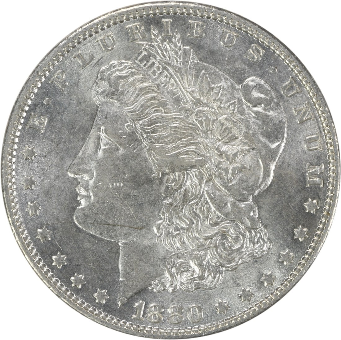 Brilliant Uncirculated 1880 Silver Morgan Dollar Uncertified No Mint Mark: Brilliant Uncirculated 1880 Silver Morgan Dollar Uncertified No Mint Mark This 1880 Morgan Silver Dollar is an uncirculated coin from the United States, featuring a Brilliant Uncirculated (BU) grade. 