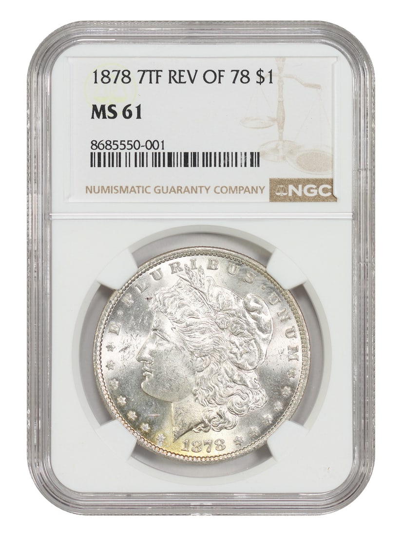 NGC MS61 1878 Morgan Dollar 7 Tail Feathers Reverse of 1878: NGC MS61 1878 Morgan Dollar 7 Tail Feathers Reverse of 1878 This 1878 Morgan Dollar features the 7 Tail Feathers Reverse of 1878 design. Graded MS61 by NGC, this uncirculated coin was struck at the Ph