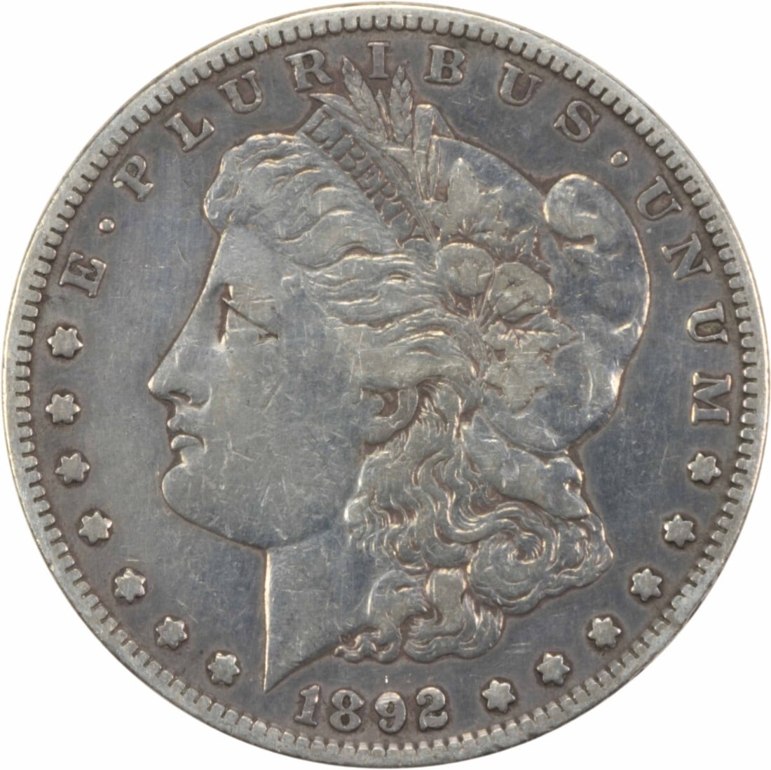 1892-S Morgan Silver Dollar VF Uncertified 90% Silver Coin: 1892-S Morgan Silver Dollar VF Uncertified 90% Silver Coin This 1892-S Morgan Silver Dollar is a beautiful representation of American coinage. Crafted from 90% silver and 10% copper, this coin feature
