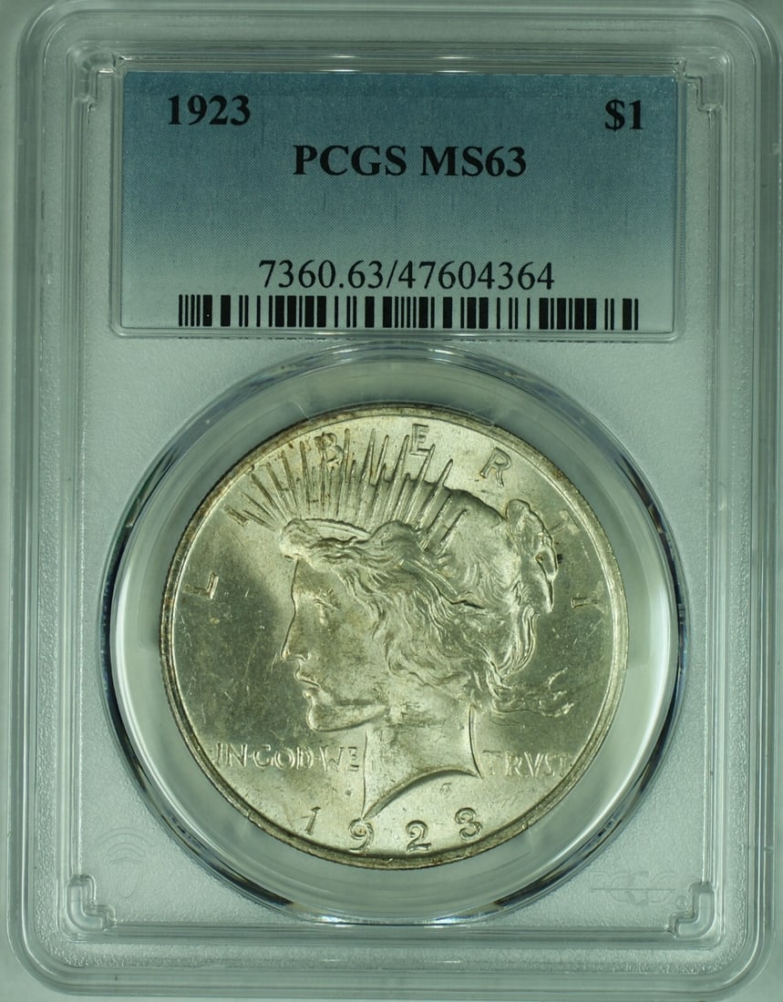 PCGS MS 63 Graded 1923 Silver Peace Dollar Uncirculated $1 Coin: PCGS MS 63 Graded 1923 Silver Peace Dollar Uncirculated $1 Coin This 1923 Peace Silver Dollar is a $1 coin from the United States, composed of silver. It is graded MS 63 by PCGS and is uncirculated. T