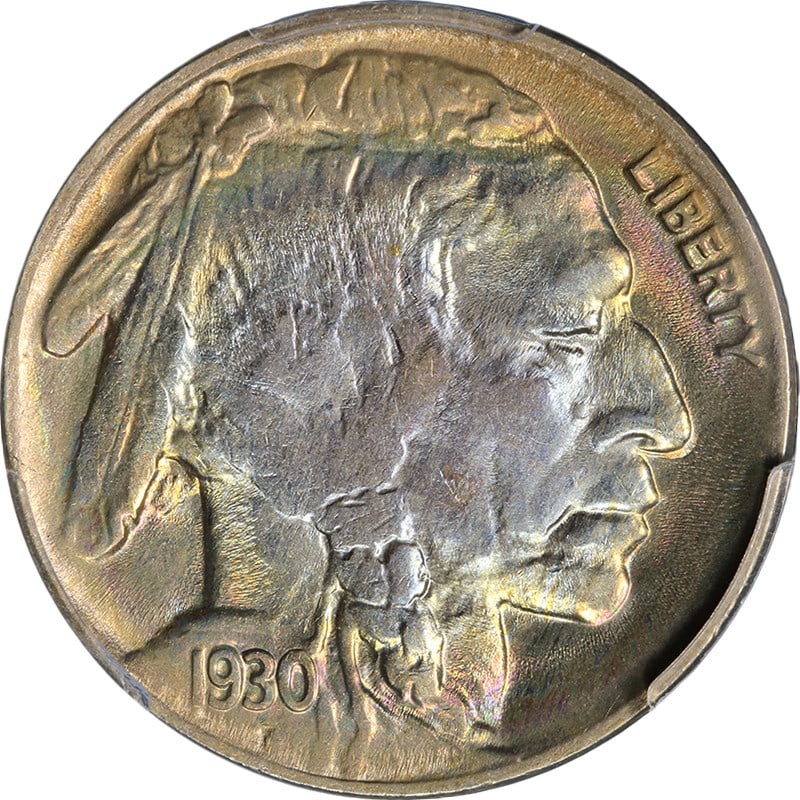Rainbow Toned 1930-P Buffalo Nickel PCGS MS64 Uncirculated: Rainbow Toned 1930-P Buffalo Nickel PCGS MS64 Uncirculated This original 1930-P Buffalo Nickel features a striking rainbow-toned obverse, showcasing exceptional eye appeal, luster, and surfaces. Grade