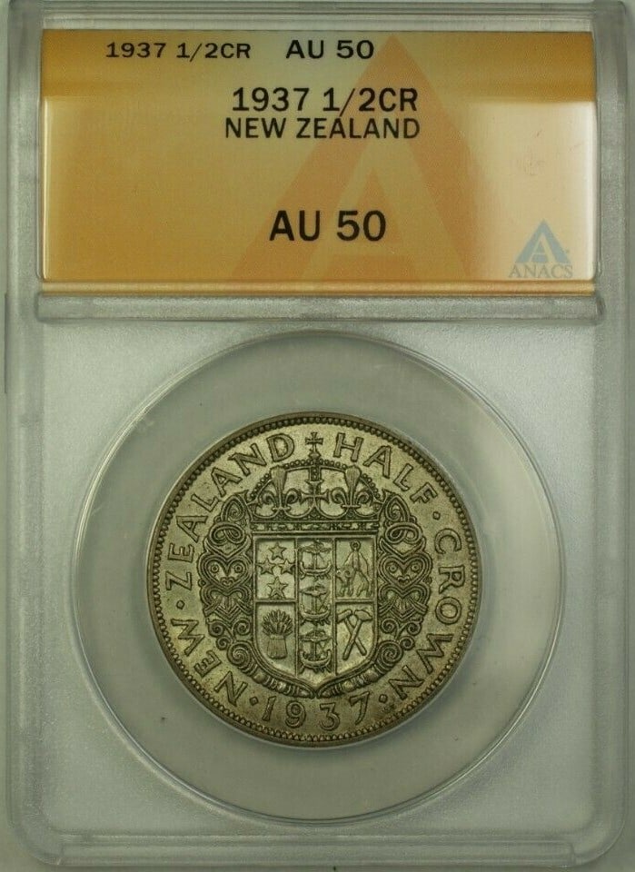 1937 New Zealand Half Crown ANACS Certified AU 50 Coin: 1937 New Zealand Half Crown ANACS Certified AU 50 Coin This is a 1937 New Zealand 1/2 Crown coin, certified and graded AU 50 by ANACS. The coin is pre-owned and originates from New Zealand. Specificat