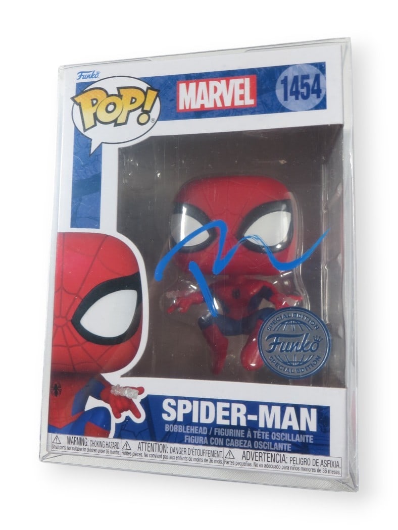 Spider-Man 1454 Funko POP Figure Signed by Tobey Maguire Beckett Authenticated: Spider-Man 1454 Funko POP Figure Signed by Tobey Maguire Beckett Authenticated This Funko POP! Figure features Spider-Man and has been autographed by Tobey Maguire. The authenticity of the autograph i