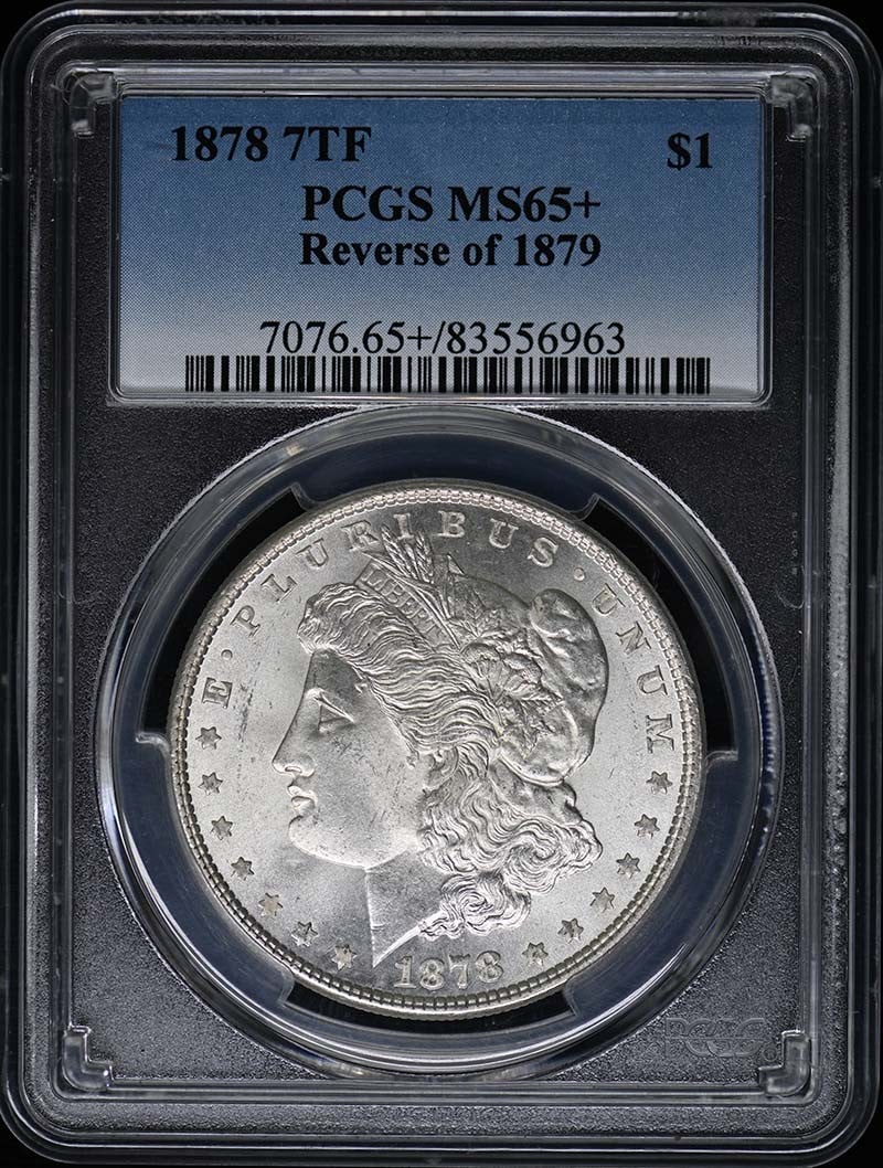 1878 Morgan Dollar $1 7TF PCGS MS65+ Uncirculated: 1878 Morgan Dollar $1 7TF PCGS MS65+ Uncirculated This stunning 1878 Morgan Dollar, featuring the reverse design of the 1879 coin, is certified by PCGS and boasts a remarkable grade of MS65+. This unc