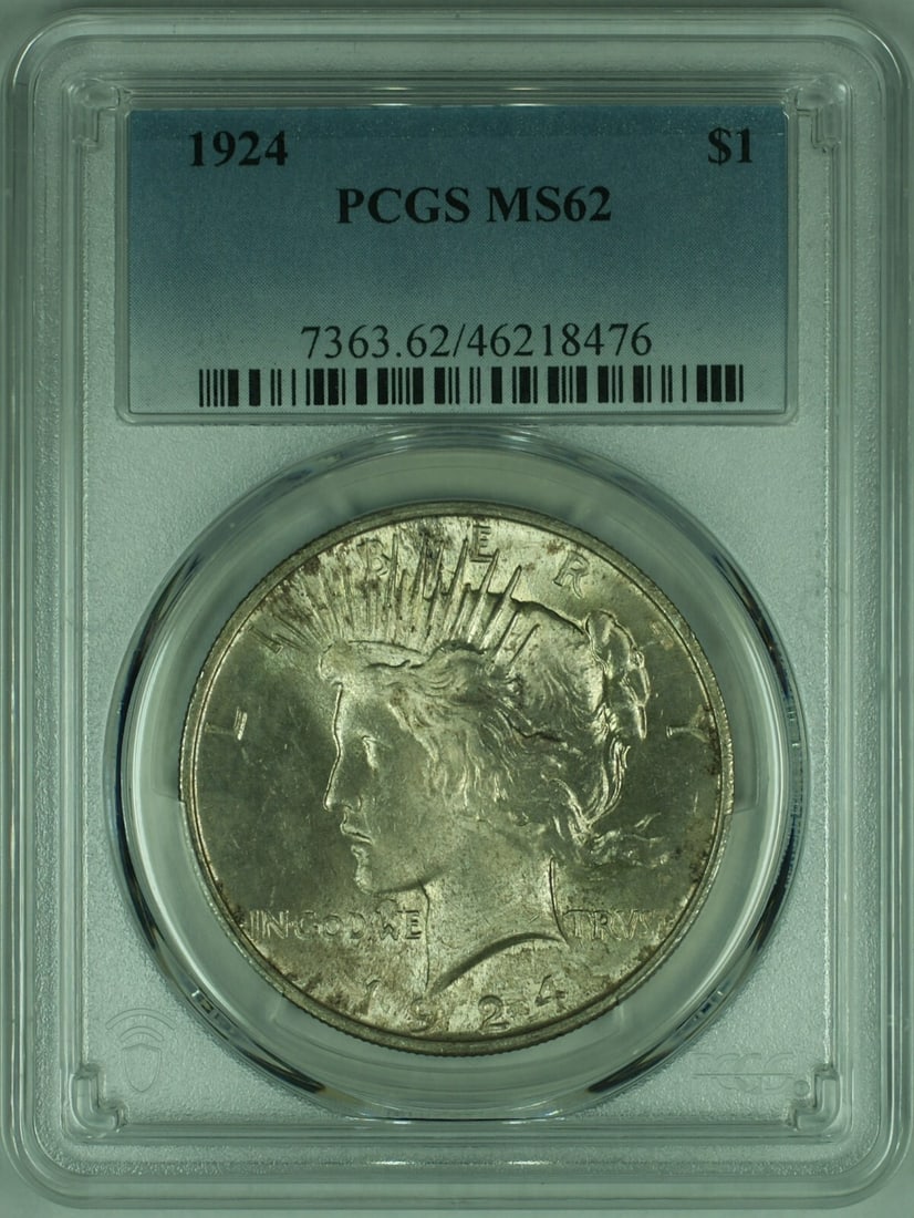 PCGS MS62 1924 Peace Dollar Silver Coin With Toning: PCGS MS62 1924 Peace Dollar Silver Coin With Toning This is a 1924 Peace Silver Dollar graded MS-62 by PCGS. The coin is composed of 90% silver and features natural toning. It is an uncirculated examp