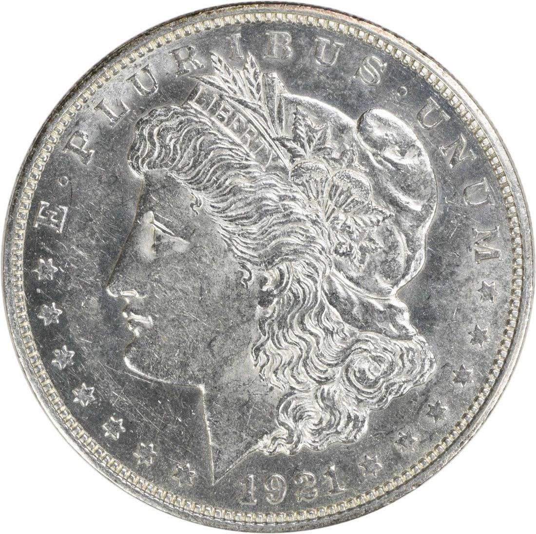 Uncirculated 1921-D Morgan Silver Dollar Brilliant Uncertified US Coin: Uncirculated 1921-D Morgan Silver Dollar Brilliant Uncertified US Coin This is a 1921-D Morgan Silver Dollar from the Denver Mint, featuring brilliant uncirculated condition. The coin is composed of s