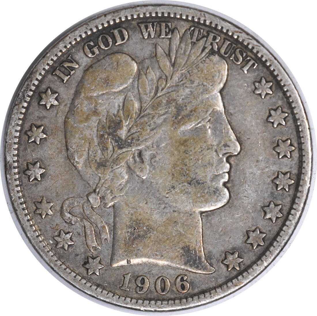 1906-D Barber Silver Half Dollar 50C Uncertified Coin VF: 1906-D Barber Silver Half Dollar 50C Uncertified Coin VF This 1906-D Barber Silver Half Dollar features a vintage design by Charles E. Barber. Struck in Denver, this coin is part of a limited mintage 