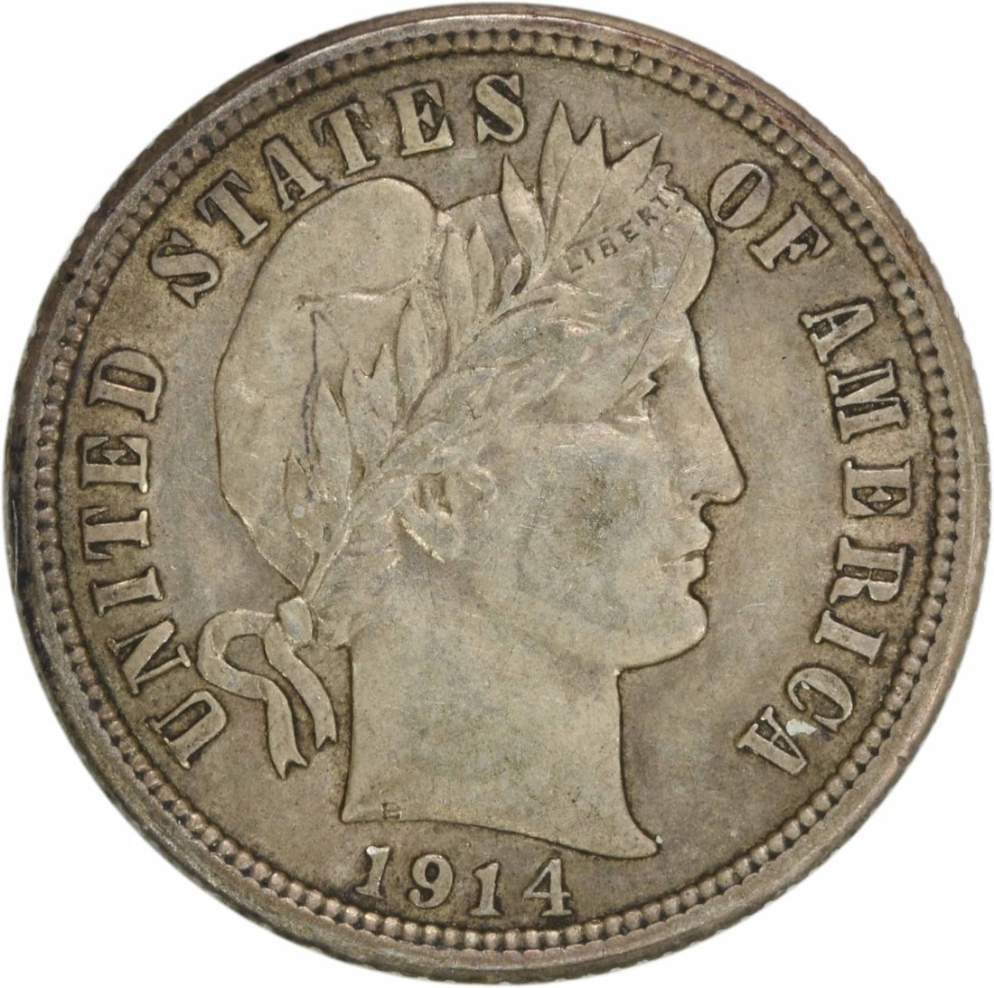 1914 Barber Silver Dime 90% Silver AU Uncertified: 1914 Barber Silver Dime 90% Silver AU Uncertified This 1914 Barber Silver Dime, a classic coin from the United States, showcases the artistry of designer Charles E. Barber. It is circulated and graded