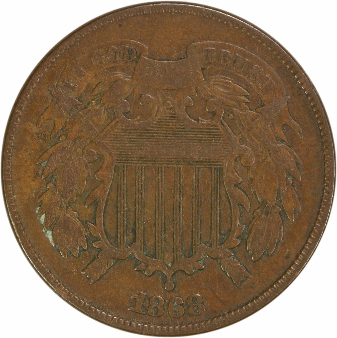 1868 Two Cent Piece VF Bronze Uncertified US Coin: 1868 Two Cent Piece VF Bronze Uncertified US Coin This 1868 Two Cent Piece is a remarkable example of American numismatics. Struck in bronze at the Philadelphia mint, this coin features the design of 