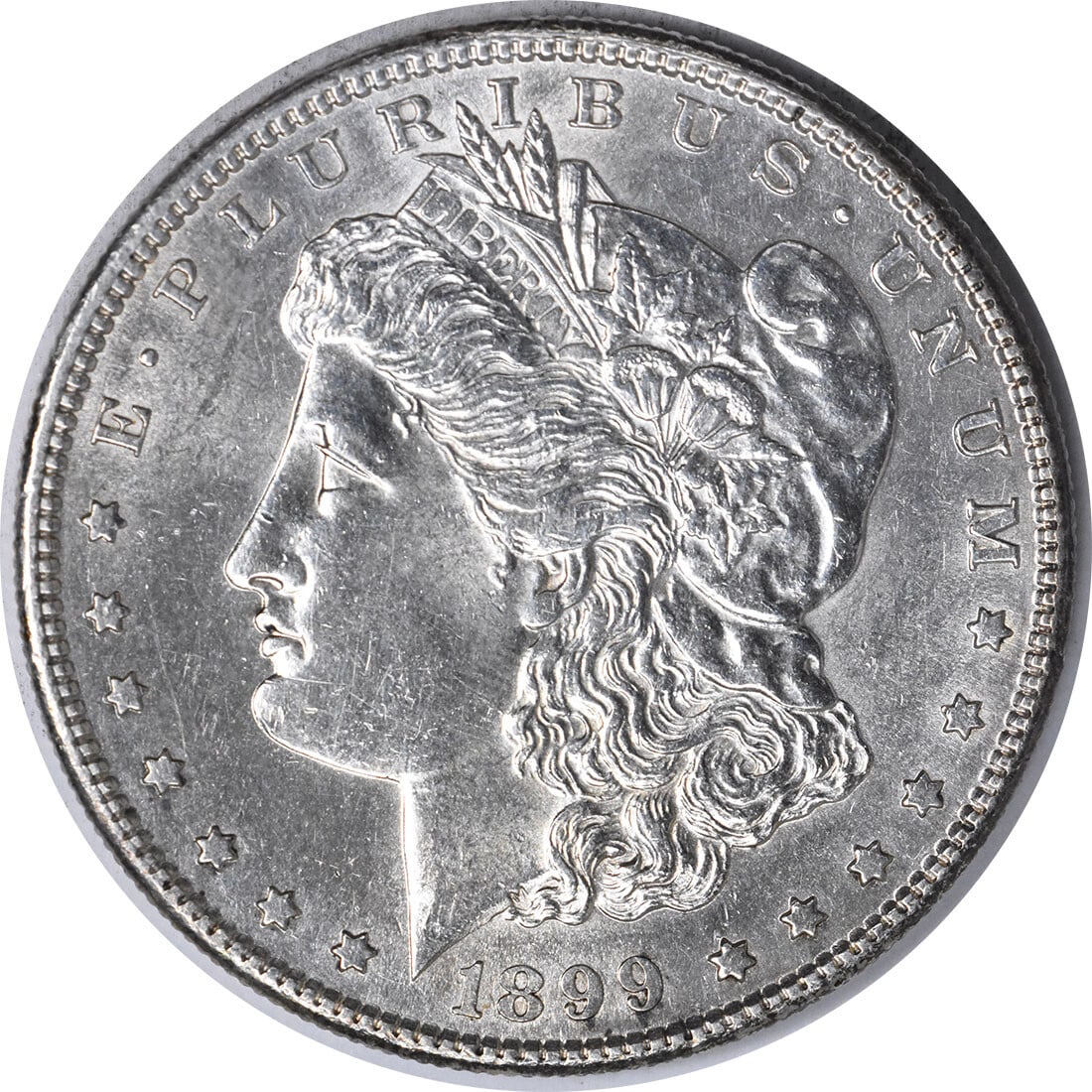 1899-S Morgan Silver Dollar AU Uncertified San Francisco Mint: 1899-S Morgan Silver Dollar AU Uncertified San Francisco Mint This 1899-S Morgan Silver Dollar is a captivating piece of numismatic history. It features a composition of 90% silver and 10% copper, hai