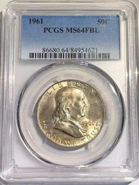 1961 P Franklin Half Dollar Silver PCGS MS 64 Certified: 1961 P Franklin Half Dollar Silver PCGS MS 64 Certified This 1961 P Franklin Half Dollar is a remarkable piece certified by PCGS with a grade of MS-64. Composed of high-quality silver, this uncirculat