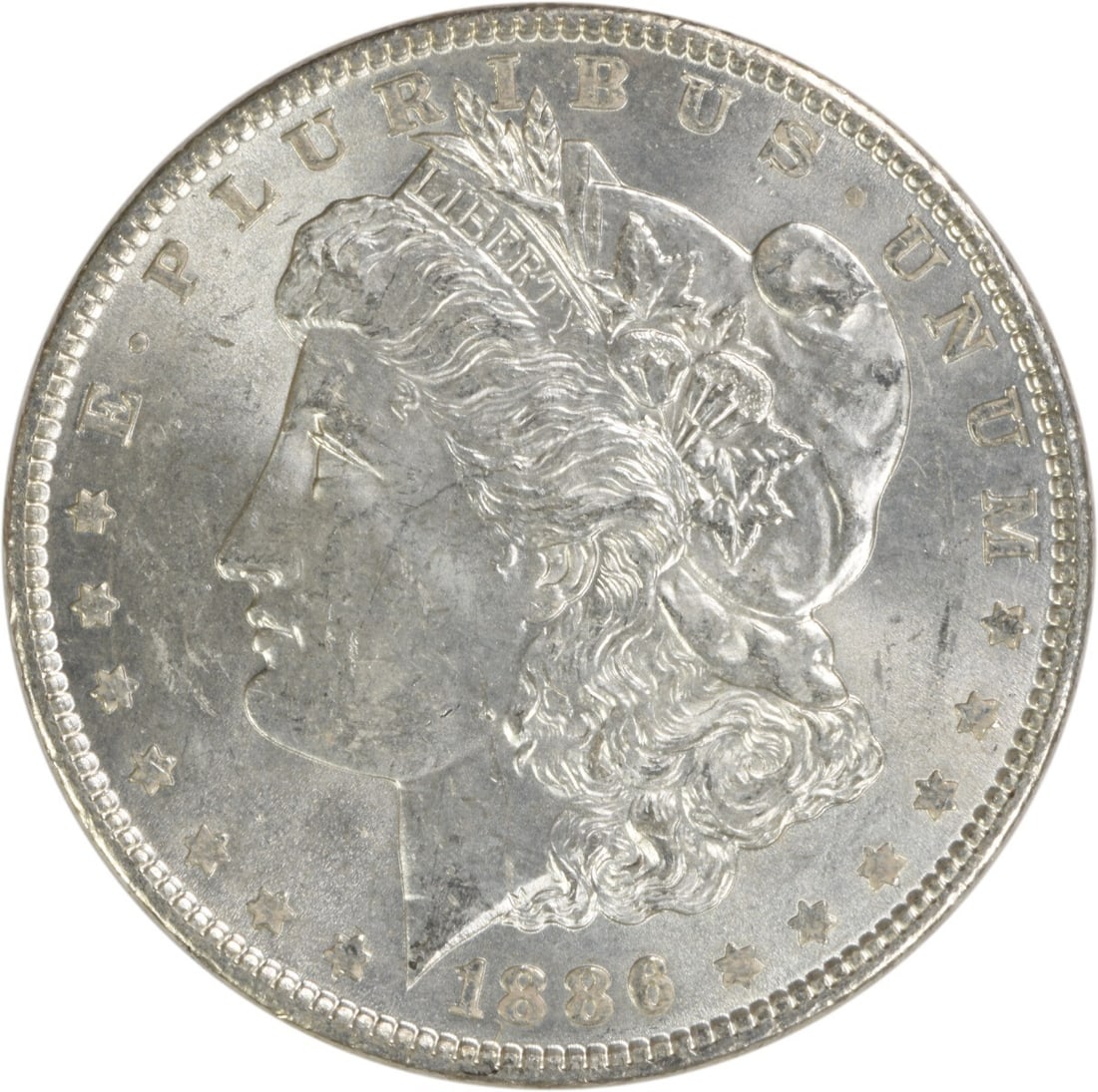 Uncirculated 1886 Morgan Dollar Silver Coin No Mint Mark BU Grade: Uncirculated 1886 Morgan Dollar Silver Coin No Mint Mark BU Grade This is an 1886 Morgan Silver Dollar from the United States, featuring a brilliant uncirculated (BU) grade. The coin is uncertified an