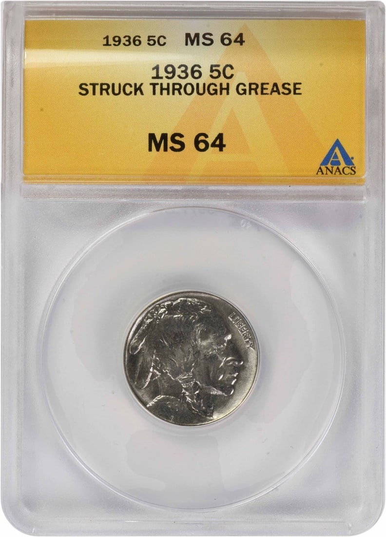1936 Buffalo Five Cent Nickel MS64 ANACS Struck Through Grease Error: 1936 Buffalo Five Cent Nickel MS64 ANACS Struck Through Grease Error This 1936 Buffalo Nickel features a rare struck through grease error and has been certified by ANACS with a grade of MS64. The coin