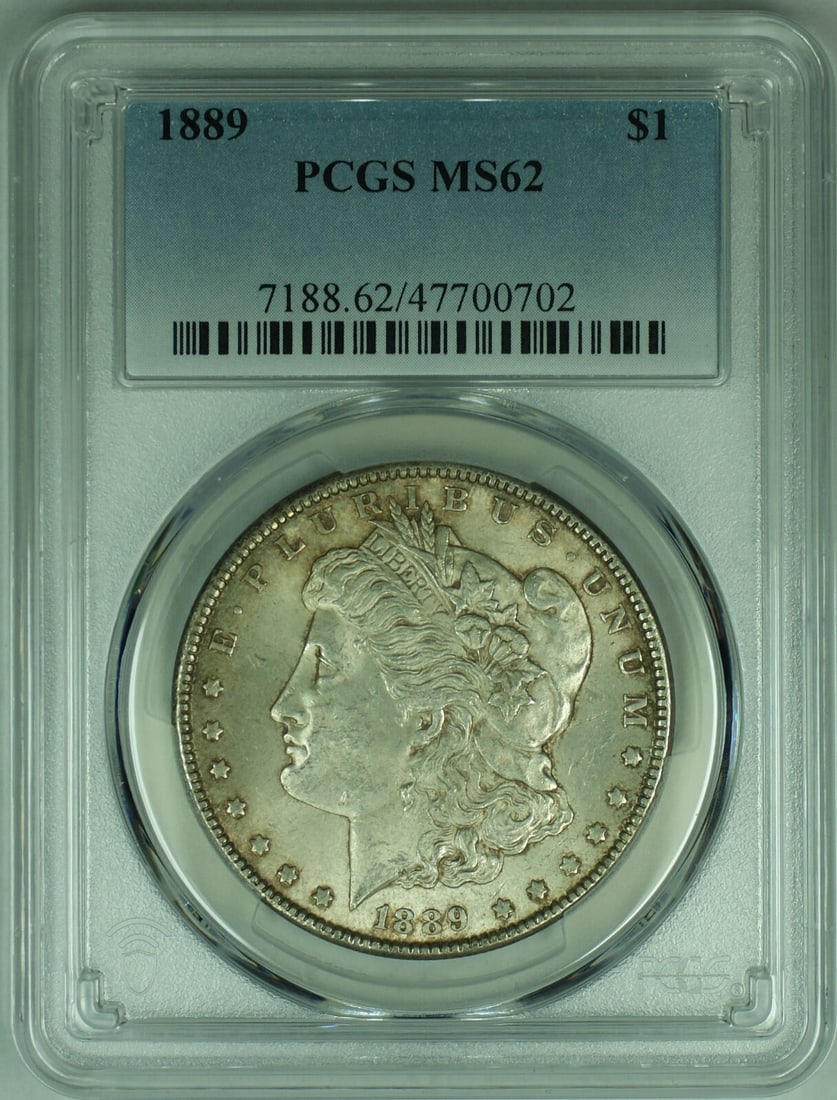 PCGS MS 62 Plus 1889 Morgan Silver Dollar with Attractive Toning: PCGS MS 62 Plus 1889 Morgan Silver Dollar with Attractive Toning This is an 1889 Morgan Silver Dollar featuring attractive toning. The coin is certified by PCGS with a grade of MS 62+. It is uncircula