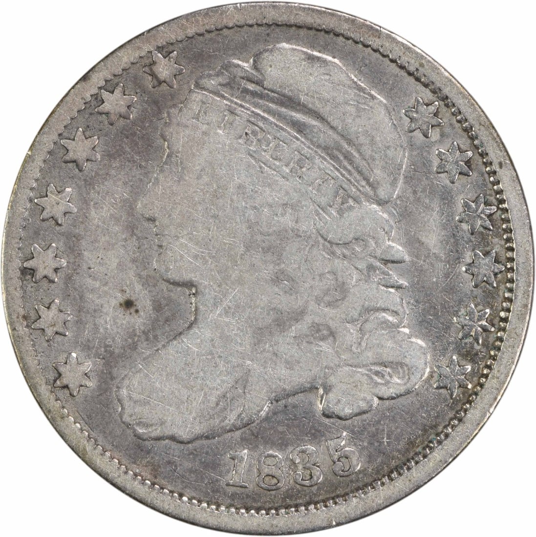 1835 Capped Bust Silver Dime 10C Uncertified Circulated Coin: 1835 Capped Bust Silver Dime 10C Uncertified Circulated Coin This 1835 Capped Bust Silver Dime is a remarkable piece of American numismatic history. Originating from the Philadelphia mint, this coin f