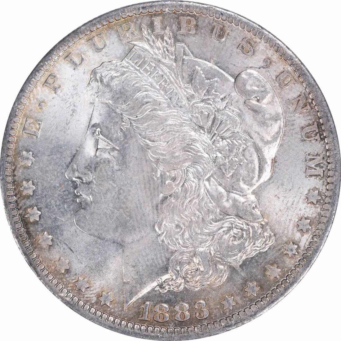 Uncirculated 1883-O Morgan Dollar Silver Toned Choice BU Uncertified: Uncirculated 1883-O Morgan Dollar Silver Toned Choice BU Uncertified This is an 1883-O Morgan Silver Dollar featuring attractive toning. The coin is uncirculated and in Choice Brilliant Uncirculated (