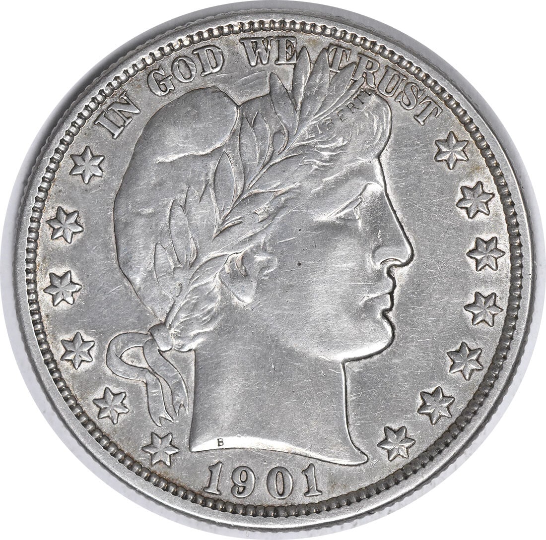 1901-O Barber Half Dollar 50C Silver Coin by Charles E Barber: 1901-O Barber Half Dollar 50C Silver Coin by Charles E Barber This 1901-O Barber Silver Half Dollar is a remarkable piece of numismatic history. Struck in New Orleans, this coin features a composition