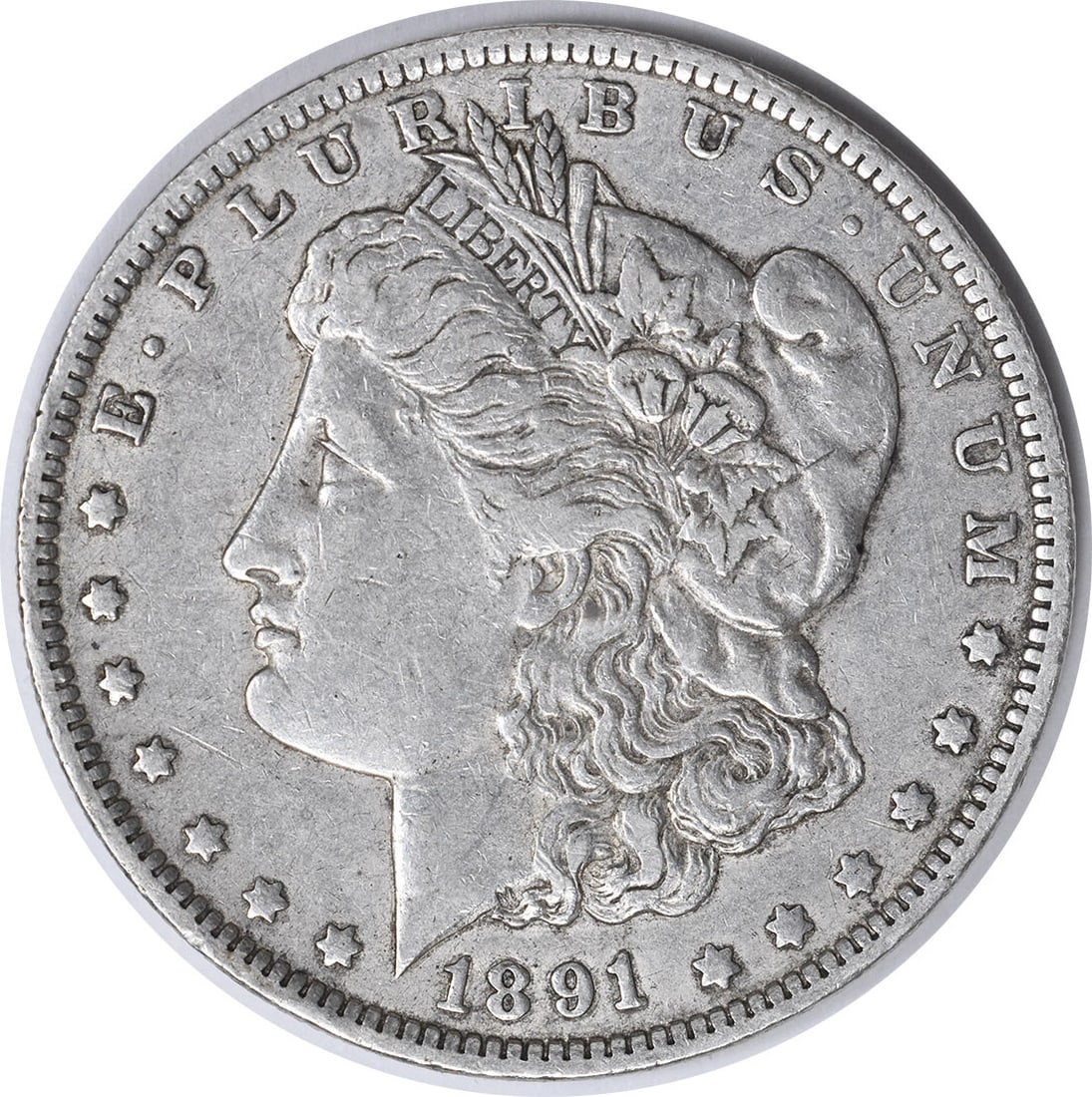 1891-O Morgan Silver Dollar XF Uncertified New Orleans Mint: 1891-O Morgan Silver Dollar XF Uncertified New Orleans Mint This 1891-O Morgan Silver Dollar is a remarkable piece of numismatic history. Struck at the New Orleans Mint, this coin features the iconic 