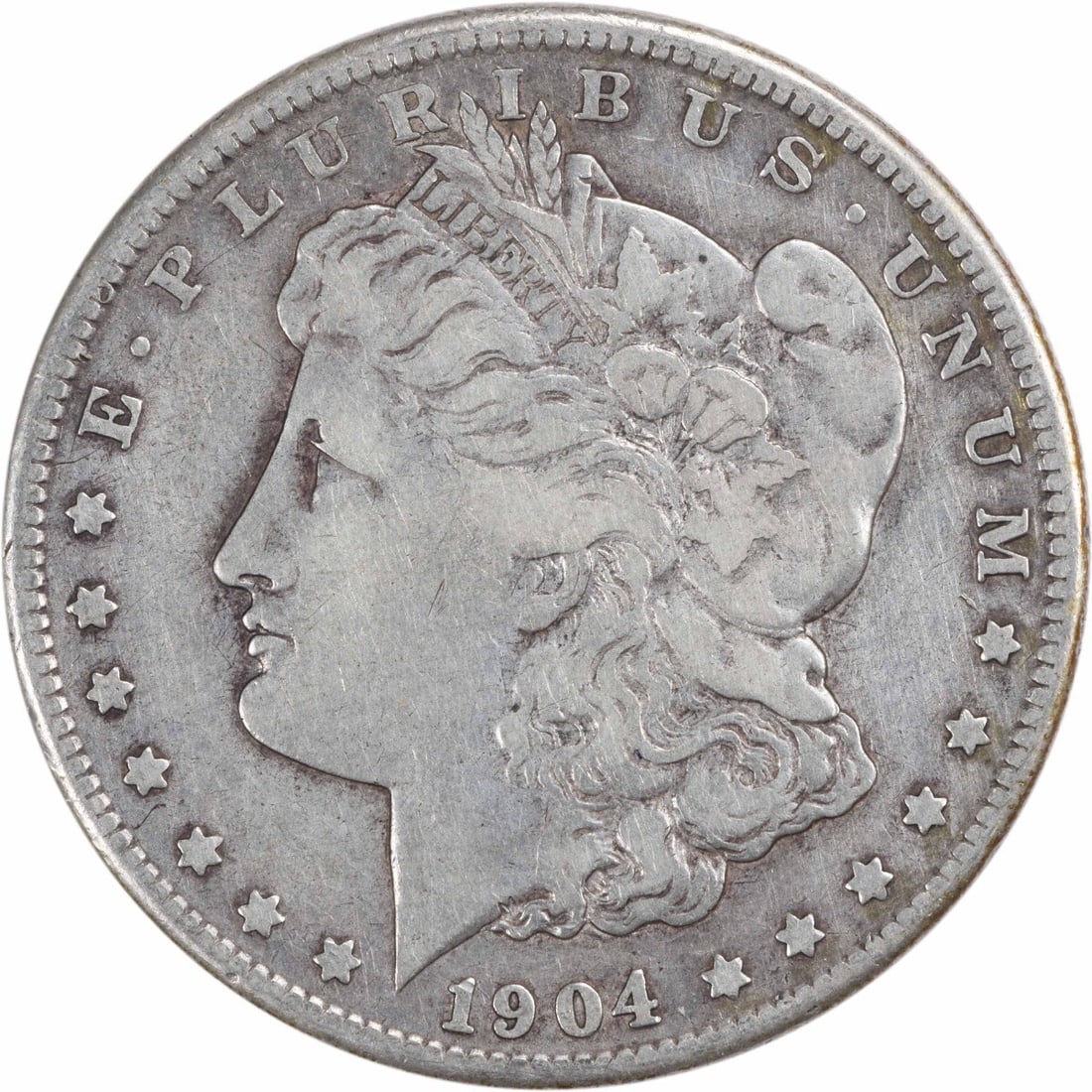 1904-S Morgan Silver Dollar VF Uncertified 90% Silver Coin: 1904-S Morgan Silver Dollar VF Uncertified 90% Silver Coin This 1904-S Morgan Silver Dollar is a remarkable collectible piece, featuring the classic design by George T. Morgan. The coin is circulated,