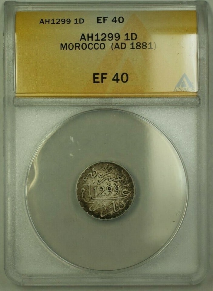 Morocco 1881 1 Dirham ANACS Certified EF 40 Coin: Morocco 1881 1 Dirham ANACS Certified EF 40 Coin This is a Morocco 1 Dirham coin minted in 1881 (AH1299), certified by ANACS with a grade of EF 40. The coin is pre-owned and features historical signif