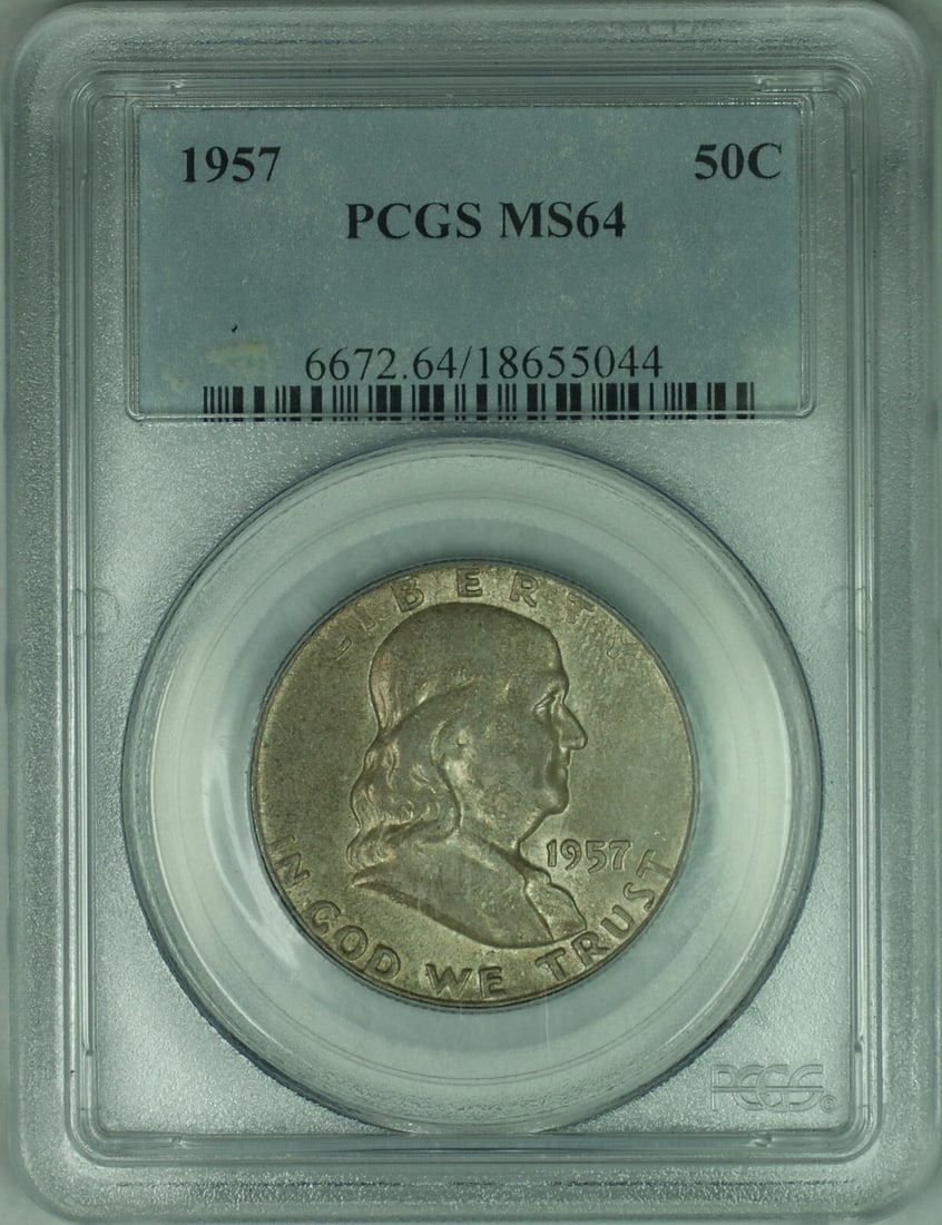PCGS MS-64 1957 Silver Franklin Half Dollar With Toning: PCGS MS-64 1957 Silver Franklin Half Dollar With Toning This is a 1957 Franklin Silver Half Dollar graded MS-64 by PCGS, featuring attractive toning. The coin is uncirculated and was minted in Philade
