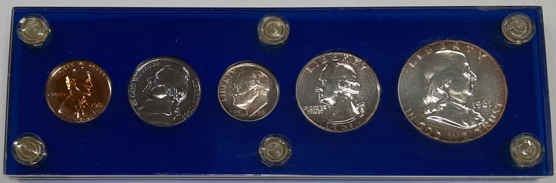 Five Coin 1961 Silver Proof US Mint Set in Blue Acrylic Display: Five Coin 1961 Silver Proof US Mint Set in Blue Acrylic Display This 1961 US Mint Silver Proof Set includes five un-used coins housed in a blue acrylic holder. The set features a cent, nickel, dime, q