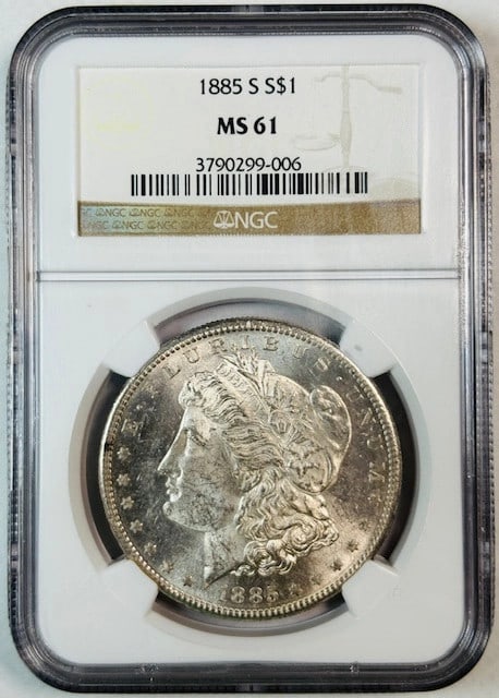 1885 S Morgan Silver Dollar NGC MS61 Uncirculated: 1885 S Morgan Silver Dollar NGC MS61 Uncirculated This 1885 S Morgan Silver Dollar is a stunning piece of American numismatic history. Graded MS-61 by NGC, this coin is classified as uncirculated, sho