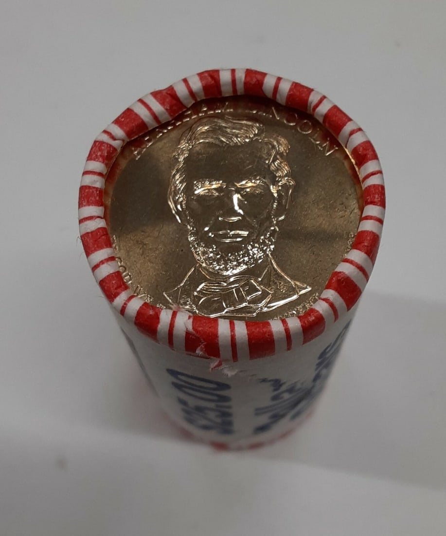 Roll of 25 Uncirculated 2010 Abraham Lincoln Presidential Dollars OBW Unknown Mint: Roll of 25 Uncirculated 2010 Abraham Lincoln Presidential Dollars OBW Unknown Mint This is a roll of 25 uncirculated 2010 Abraham Lincoln Presidential Dollar coins in their original bank wrapping. The