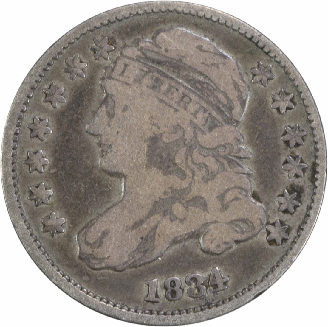 1834 Capped Bust Silver Dime 10C Philadelphia Coin Uncertified: 1834 Capped Bust Silver Dime 10C Philadelphia Coin Uncertified This 1834 Capped Bust Silver Dime is a historic coin featuring a design by John Reich. With a denomination of 10 cents, it has a composit