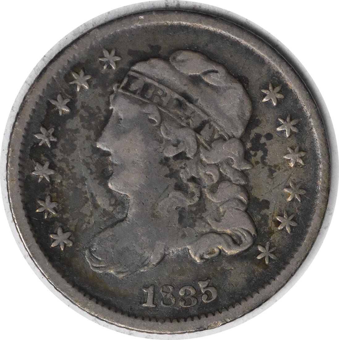 1835 Capped Bust Silver Half Dime VF Uncertified 89.2% Silver: 1835 Capped Bust Silver Half Dime VF Uncertified 89.2% Silver This 1835 Bust Silver Half Dime is a remarkable piece for collectors, featuring a Capped Bust design by William Kneass. With a grade of VF