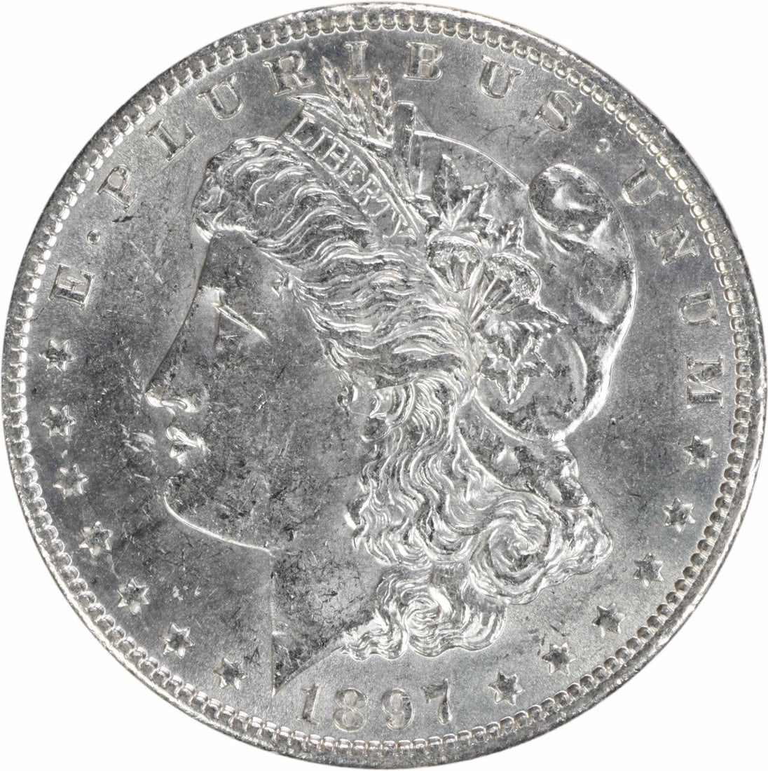 Brilliant Uncirculated 1897 Silver Dollar Morgan Type Uncertified: Brilliant Uncirculated 1897 Silver Dollar Morgan Type Uncertified This 1897 Morgan Silver Dollar is in brilliant uncirculated condition and remains uncertified. Composed of silver, this coin was minte