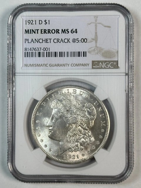 NGC MS64 1921 Denver Morgan Dollar Silver Coin With Planchet Flaw: NGC MS64 1921 Denver Morgan Dollar Silver Coin With Planchet Flaw This 1921 D Morgan Silver Dollar is certified by NGC with a grade of MS-64. Struck at the Denver Mint, this uncirculated coin is compo