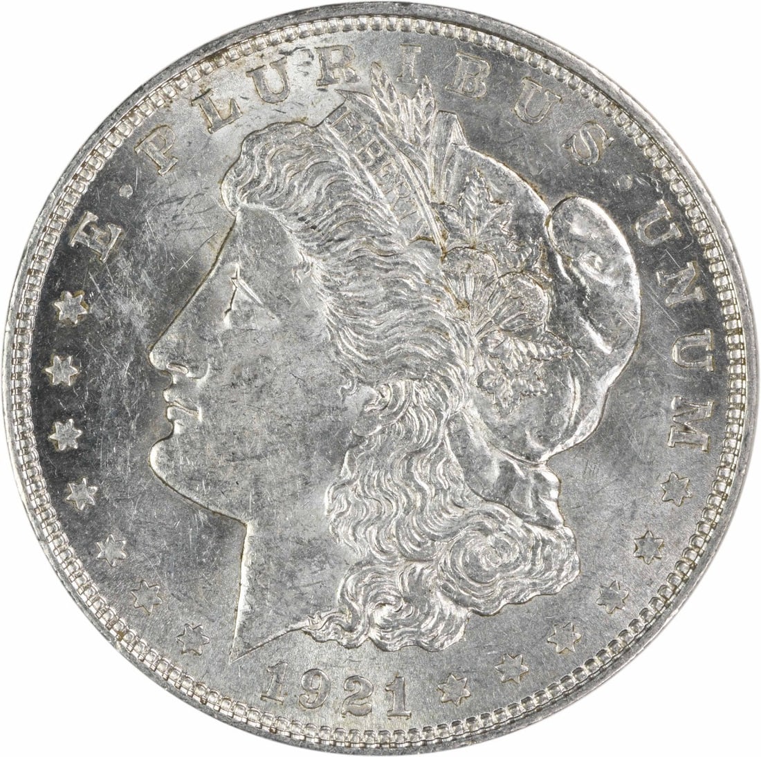 1921 Denver Morgan Dollar 90 Percent Silver AU Grade Uncertified Coin: 1921 Denver Morgan Dollar 90 Percent Silver AU Grade Uncertified Coin This 1921-D Morgan Silver Dollar is an attractive collectible coin from the Denver Mint. Struck in 90% silver and 10% copper, it f