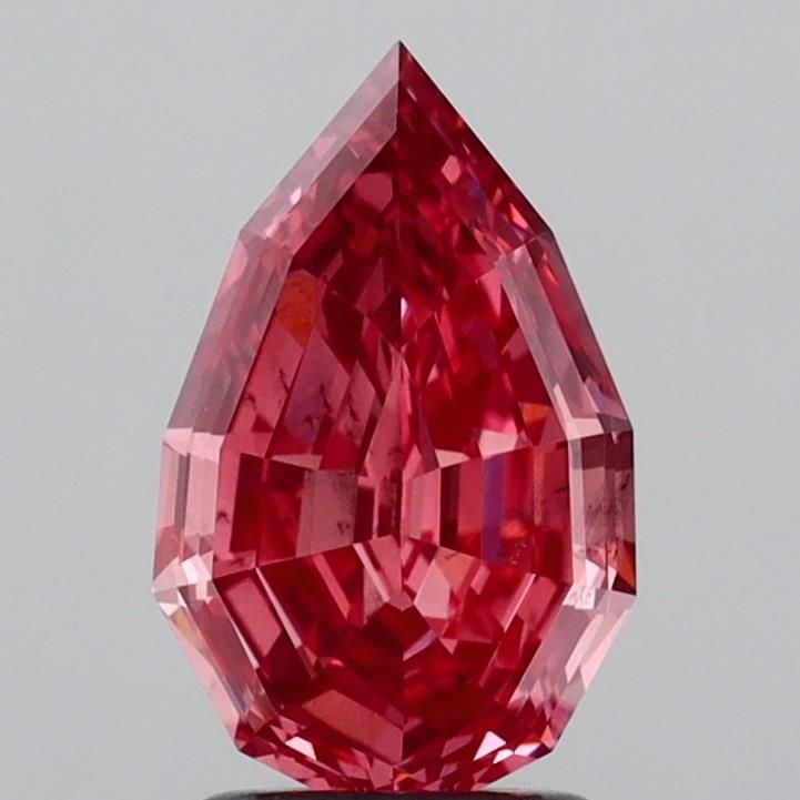Loose Diamond - PEAR 2.03ct Fancy Vivid Pink SI1: Loose Diamond - PEAR 2.03ct Fancy Vivid Pink SI1 Source: This is a real non-mined Diamond that has been grown in a lab Shape: PEAR Carats: 2.03 Color: Fancy Vivid Pink Certification: IGI Video: