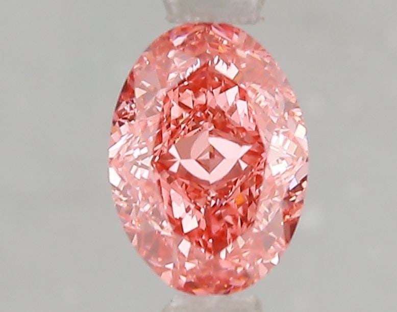 Loose Diamond - OVAL 1.06ct Fancy Vivid Pink VS1: Loose Diamond - OVAL 1.06ct Fancy Vivid Pink VS1 Source: This is a real non-mined Diamond that has been grown in a lab Shape: OVAL Carats: 1.06 Color: Fancy Vivid Pink Certification: IGI Video: