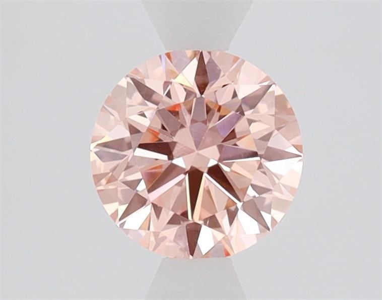 Loose Diamond - ROUND 0.89ct Fancy Vivid Pink VVS2: Loose Diamond - ROUND 0.89ct Fancy Vivid Pink VVS2 Source: This is a real non-mined Diamond that has been grown in a lab Shape: ROUND Carats: 0.89 Color: Fancy Vivid Pink Certification: IGI Video:
