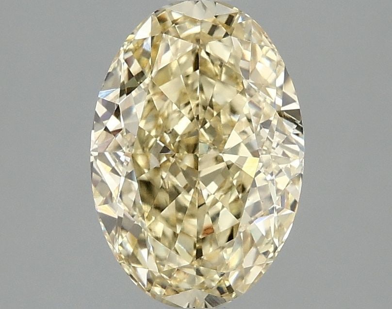 Loose Diamond - OVAL 2.1ct Fancy Intense Yellow VS1: Loose Diamond - OVAL 2.1ct Fancy Intense Yellow VS1 Source: This is a real non-mined Diamond that has been grown in a lab Shape: OVAL Carats: 2.1 Color: Fancy Intense Yellow Certification: IGI Video: