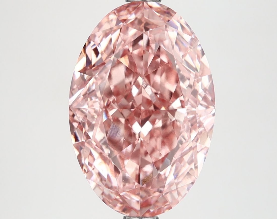 Loose Diamond - OVAL 4.54ct Fancy Vivid Pink VS1: Loose Diamond - OVAL 4.54ct Fancy Vivid Pink VS1 Source: This is a real non-mined Diamond that has been grown in a lab Shape: OVAL Carats: 4.54 Color: Fancy Vivid Pink Certification: IGI Video: